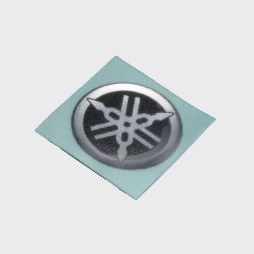 Genuine Stckr Visor Glass (Logo) For Yamaha (25Mm) for Yamaha Two-wheelers